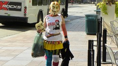 Woman masks Anonymous Guy Fawkes