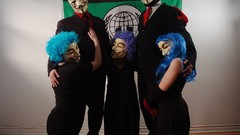 Woman masks Anonymous Guy Fawkes