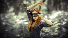 Woman masks models redheads arms raised domino mask