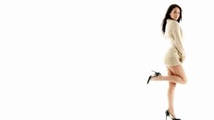 Woman Megan Fox models Simple Background