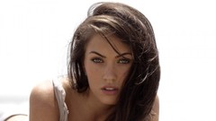 Woman Megan Fox models Simple Background