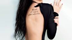 Woman Megan Fox tattoos long hair brunettes black dress open 