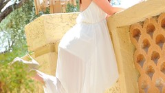 Woman melody smiling white dress redheads high heels