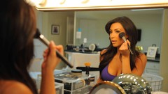 Woman mirrors cleavage kim kardashian portraits