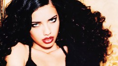 Woman models adriana lima black hair curly hair