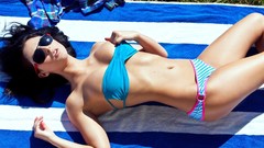 Woman models bikini Courtney Nikole