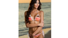 Woman models bikini Hooters