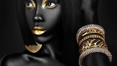 Woman models black people golden lipstick
