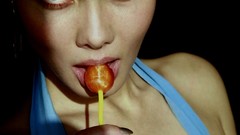 Woman models boobs lollipops Mike Dowson