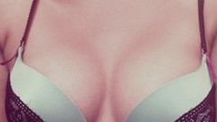 Woman models bra boobs