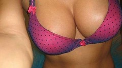 Woman models cleavage nude boobs