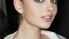 Woman models faces Darla