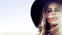 Woman models hats faces