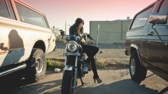 Woman models high heels girls with bikes