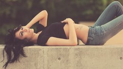 Woman models lying down