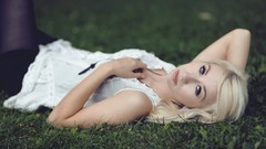 Woman models lying down Cassie Sue