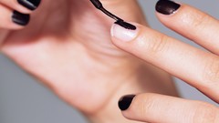 Woman models nail polish fingernails