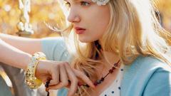 Woman models necklaces Lily