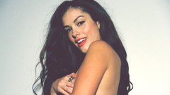 Woman models nude boobs