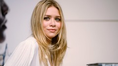 Woman models Olsen Twins