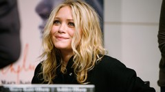 Woman models Olsen Twins