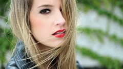 Woman models red lipstick