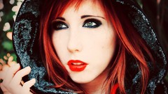 Woman models redheads capes