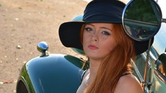 Woman models redheads retro cars
