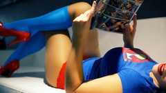 Woman models supergirl fetish