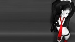 Woman models tie monochrome