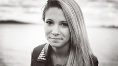 Woman monochrome blondes piercing tattoos smiling