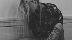 Woman monochrome blondes tattoos