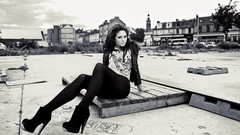 Woman monochrome legs outdoors high heels necklaces