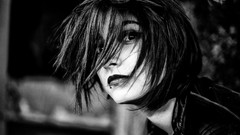 Woman monochrome piercings