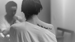 Woman monochrome tattoos black hair