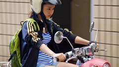Woman Moto Asia