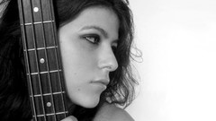 Woman Music bass guitars