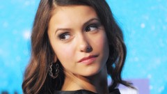 Woman Nina Dobrev faces