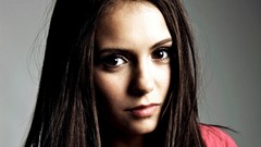Woman Nina Dobrev faces Actress brown eyes