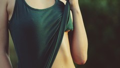 Woman no bra nipples through clothing see-through lifting shirt 