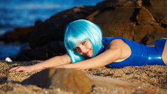 Woman ocean sand blue