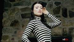 Woman Olivia Wilde models striped clothing