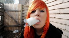 Woman orange redheads smoke