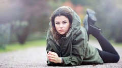 Woman outdoors brunettes lying down