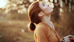 Woman outdoors ponytails redheads necklaces