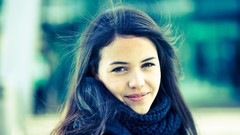 Woman outdoors smiling long hair black hair