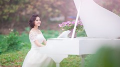 Woman piano asians vietnamese