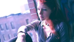 Woman piercing redheads cleavage