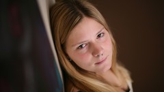 Woman piercing smiling faces
