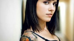 Woman piercing tattoos